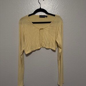 PrettyLittleThing Cream Crop Cut Out Blouse